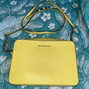 Yellow Michael Kors crossbody bad
